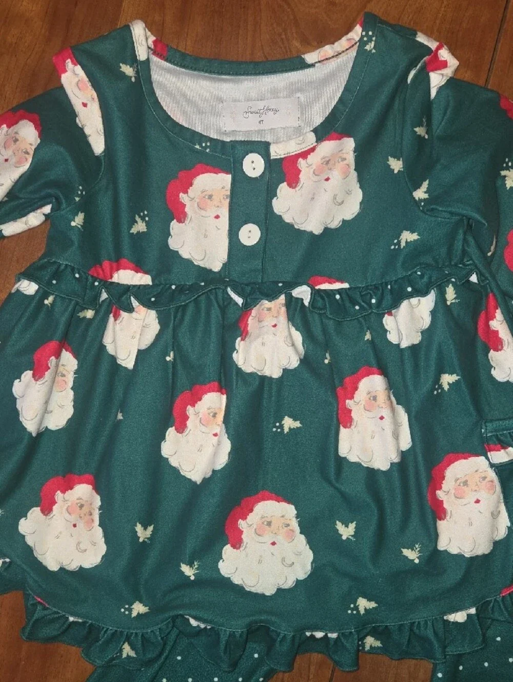 Girls Green Santa Print Pajama Set with Ruffle Top and Polka Dot Leggings